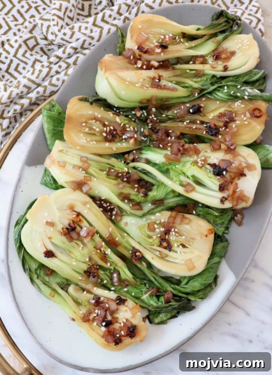 Petite Bok Choy 6 cooked baby bok choy on a serving platter