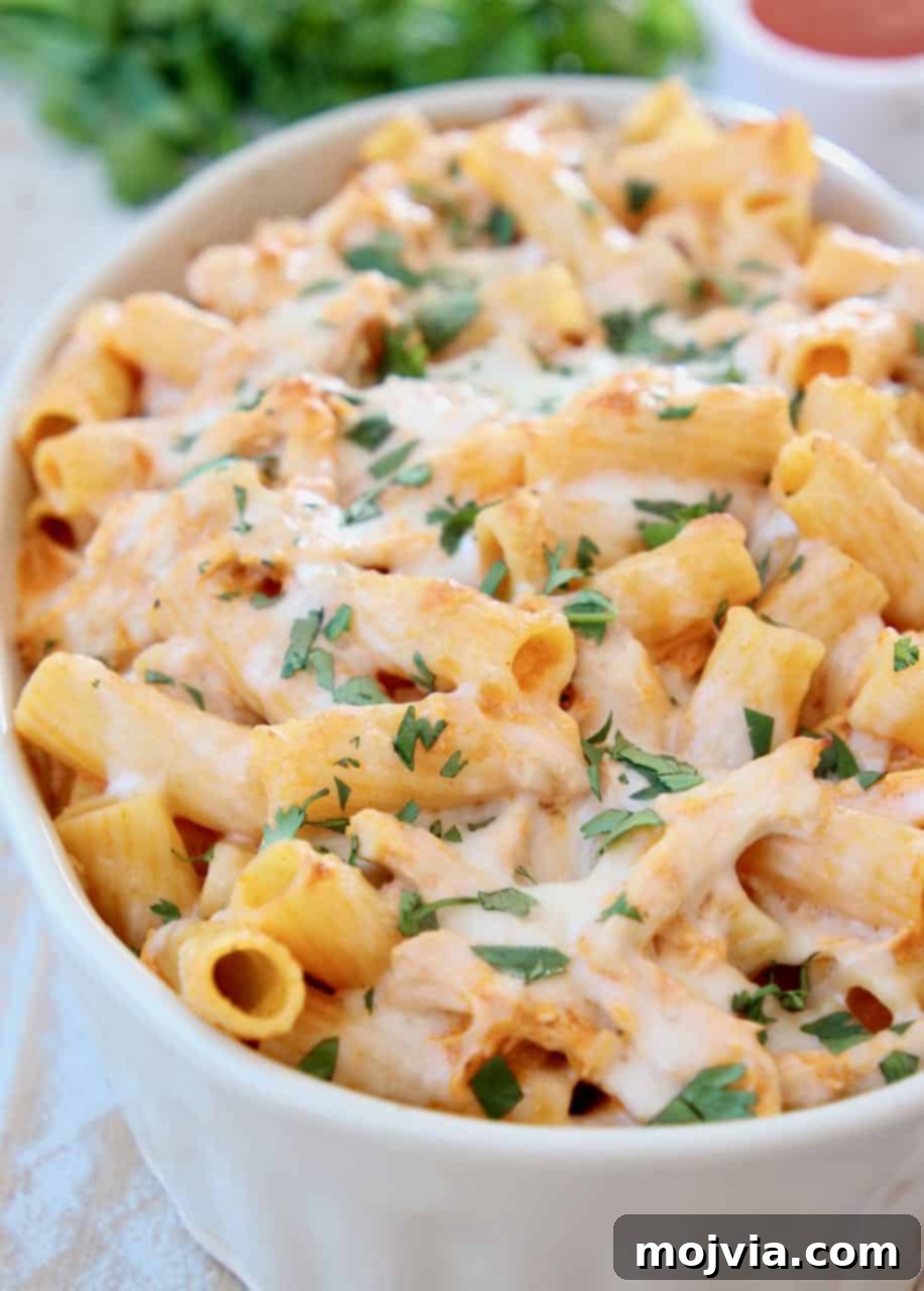 Spicy Buffalo Chicken Pasta Bake 4 Baked rigatoni with cheese in casserole dish