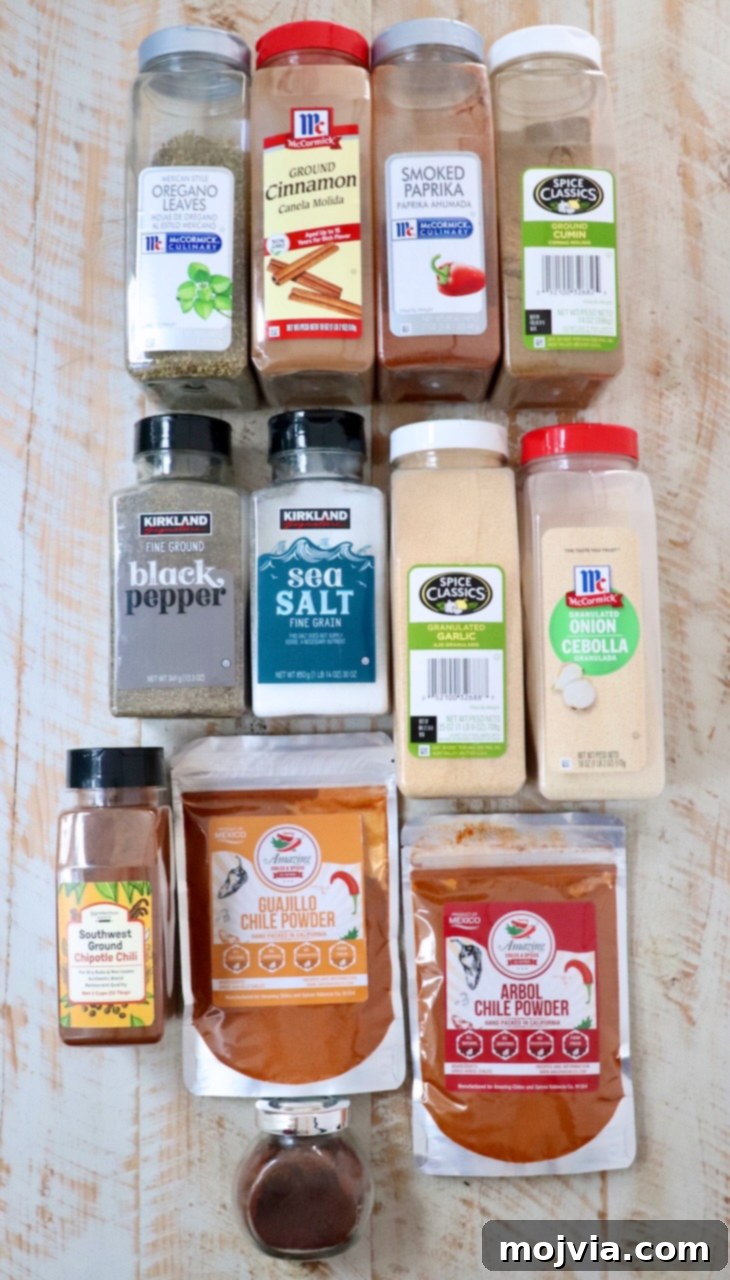 Ultimate Birria Flavor Mix 3 ingredients for birria seasoning on a white wood board