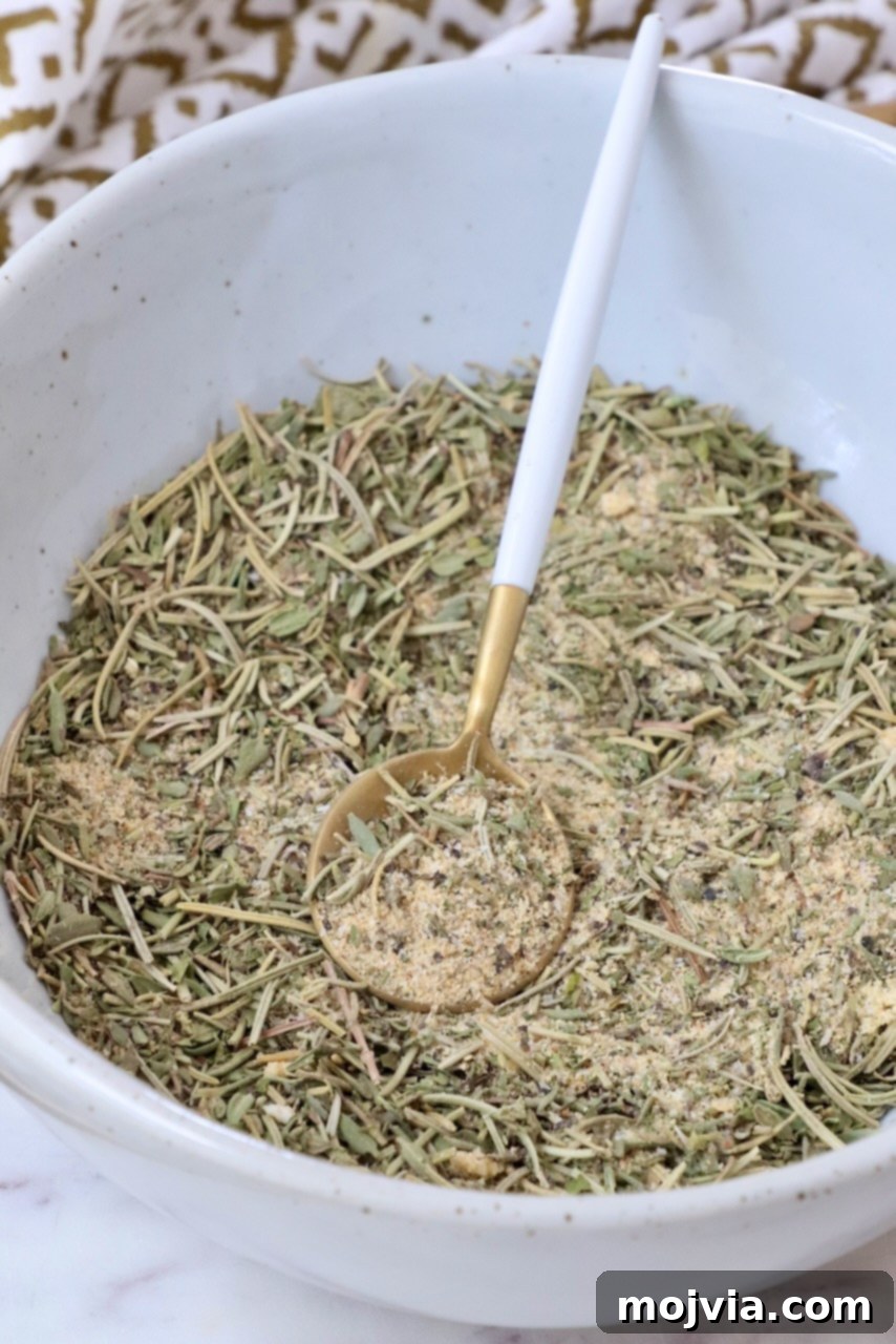 Perfect Lamb Rub 5 lamb seasoning in a decorative bowl with a wooden spoon, ready to be used or stored