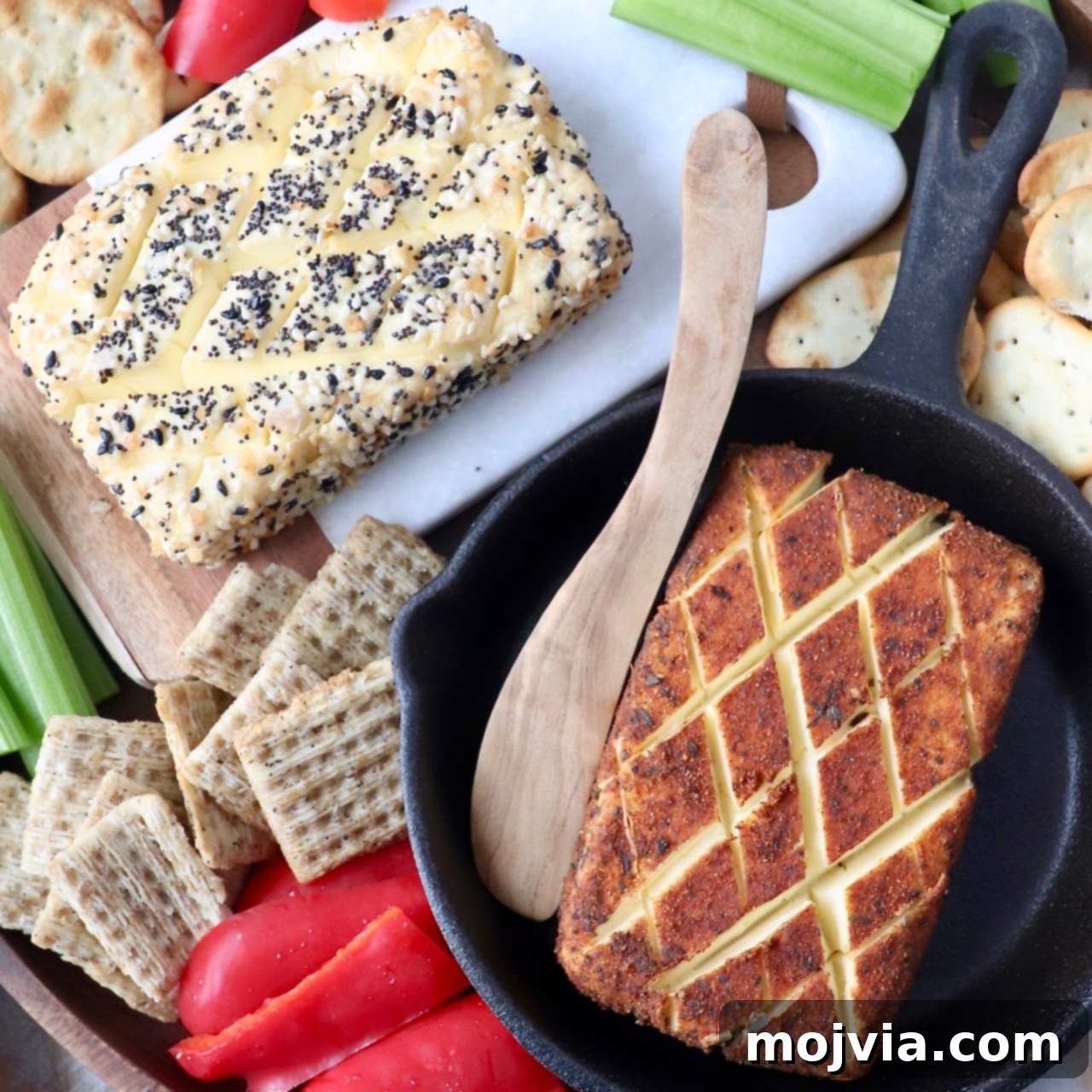 smoked cream cheese in skillet with wood serving spoon