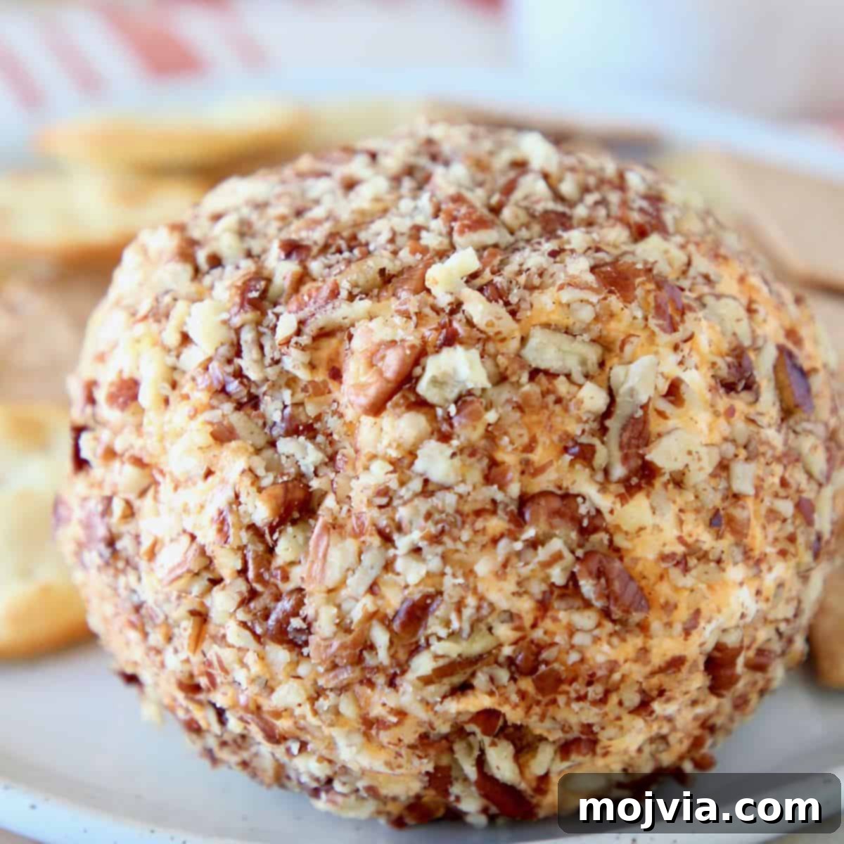 Buffalo cream cheese ball rolled in crushed pecans