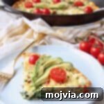 Savory Spinach and Bacon Frittata 6 Slice of frittata on plate