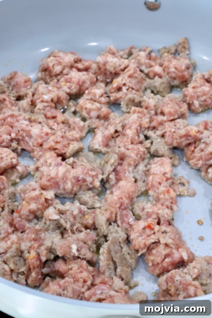 Sausage Cream Cheese Crescents 4 Ground sausage cooking in a skillet