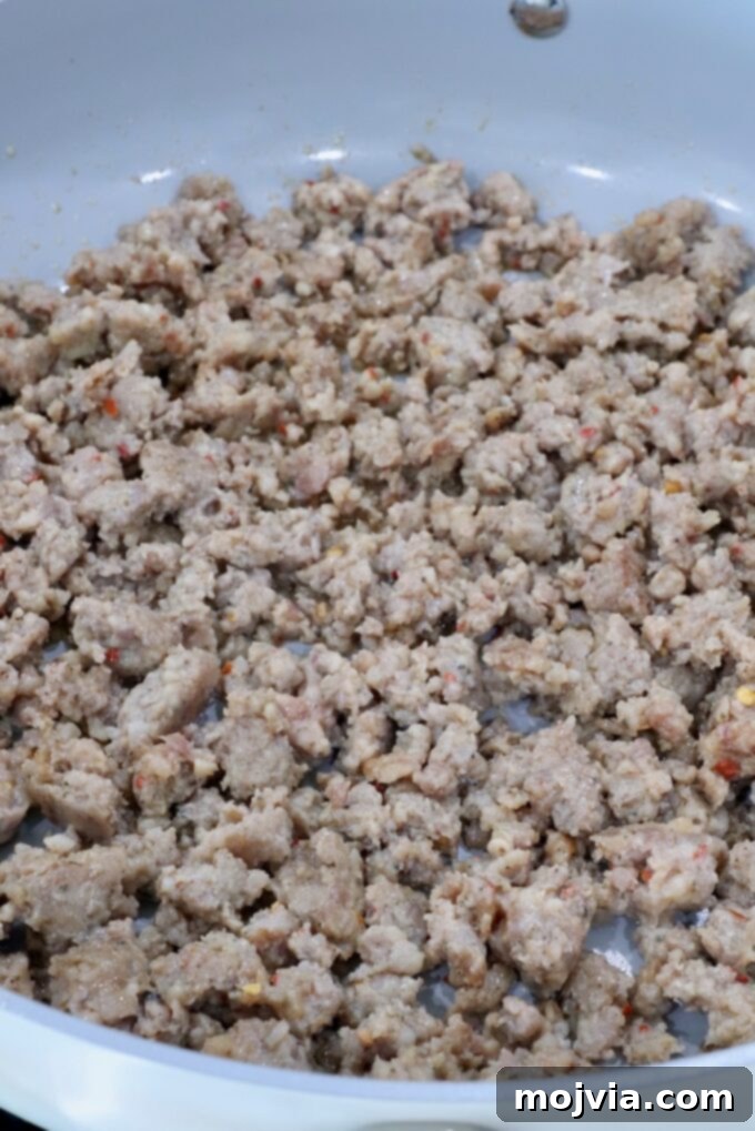 Sausage Cream Cheese Crescents 5 Cooked ground sausage in a skillet