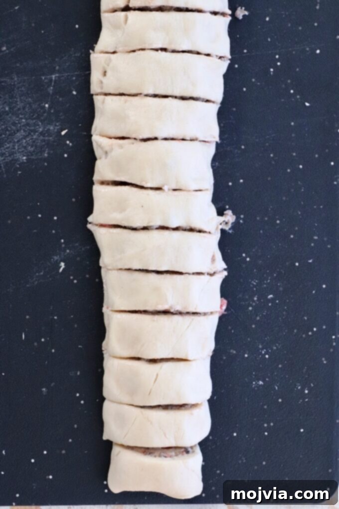 Sausage Cream Cheese Crescents 8 Dough rolled up and sliced