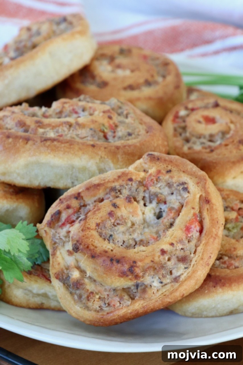 Sausage Cream Cheese Crescents 10 Close-up of sausage cream cheese crescent rolls on a plate