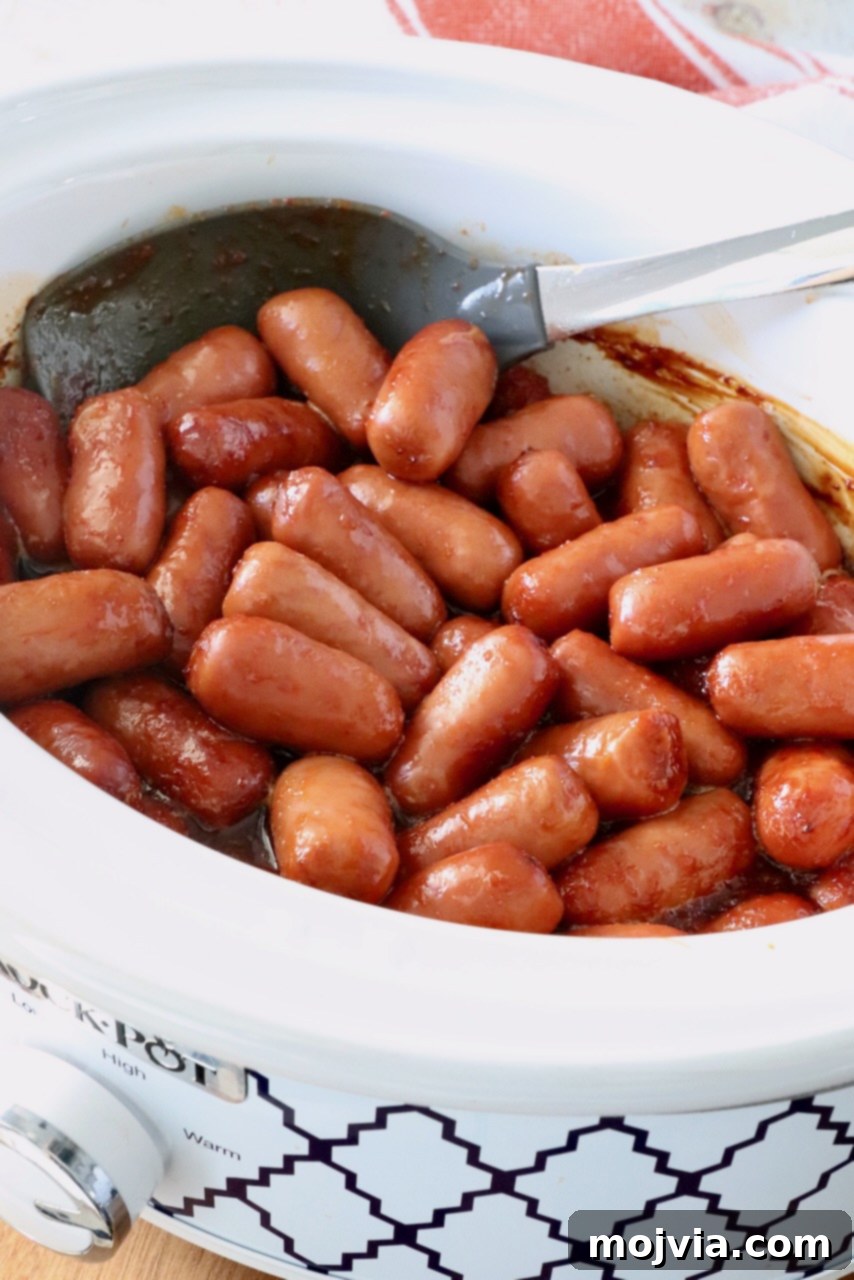 Chipotle Honey Glazed Cocktail Smokies 6 Slow cooker filled with Chipotle Honey Little Smokies