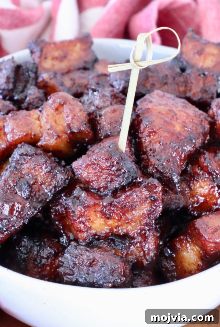 Crispy Air Fryer Pork Belly Bites 2 Close-up of glazed, caramelized pork belly burnt ends