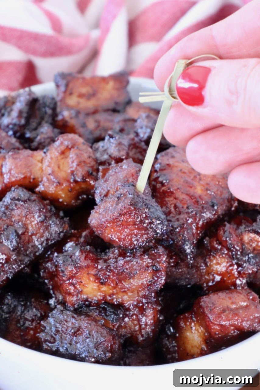 Crispy Air Fryer Pork Belly Bites 6 Close-up of a Pork Belly Bite on a Toothpick