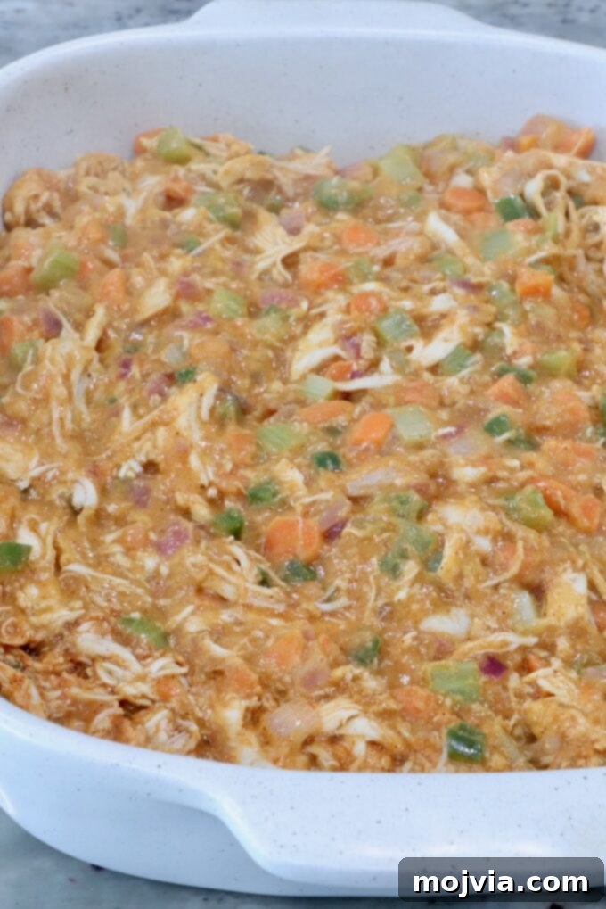 Buffalo Chicken Pot Pie
Savory Buffalo Chicken Pot Pie Delight 11 buffalo chicken pot pie filling in a baking dish