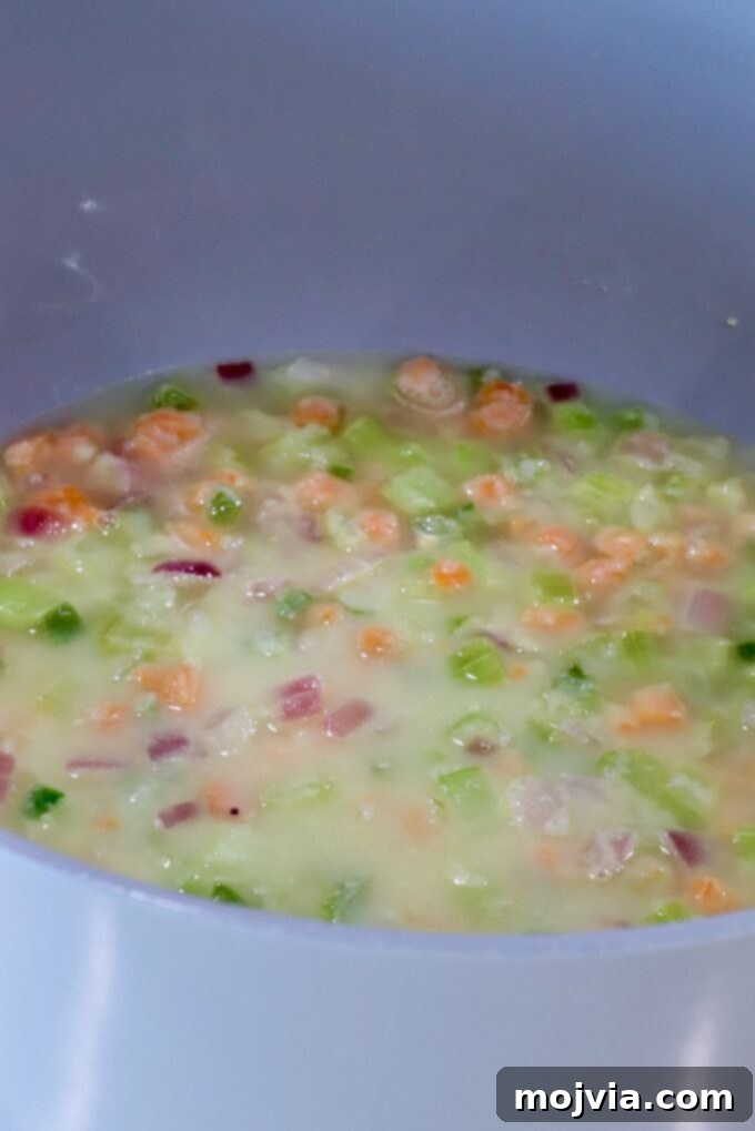 Buffalo Chicken Pot Pie
Savory Buffalo Chicken Pot Pie Delight 6 diced vegetables in a roux mixture in a large pot