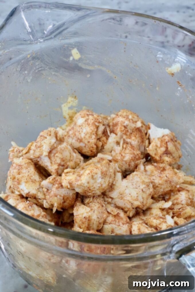 Buffalo Chicken Pot Pie
Savory Buffalo Chicken Pot Pie Delight 10 seasoned cubes of uncooked biscuit dough in a glass bowl