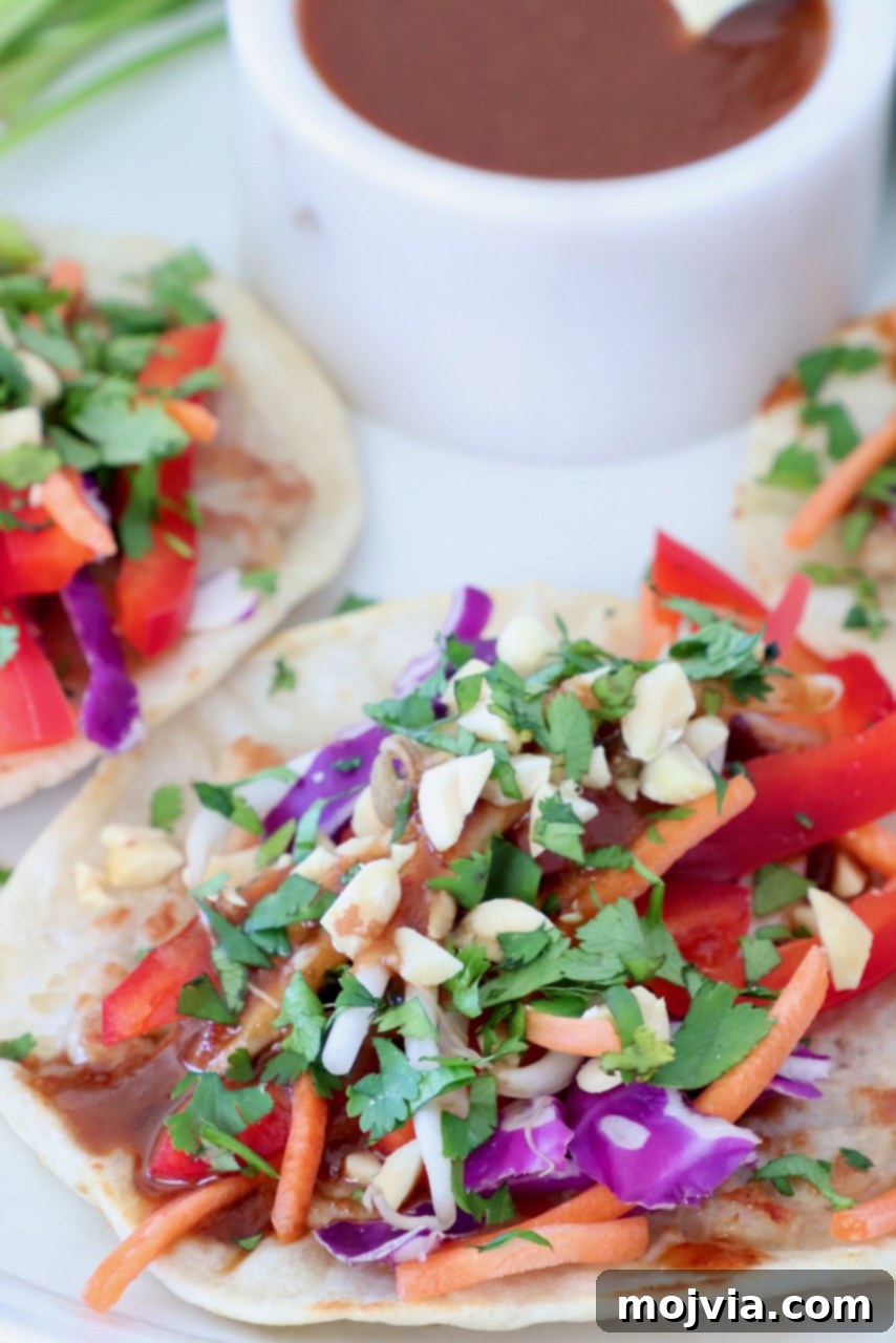 Pad Thai Tacos 2 Delicious Chicken Pad Thai Tacos with colorful toppings