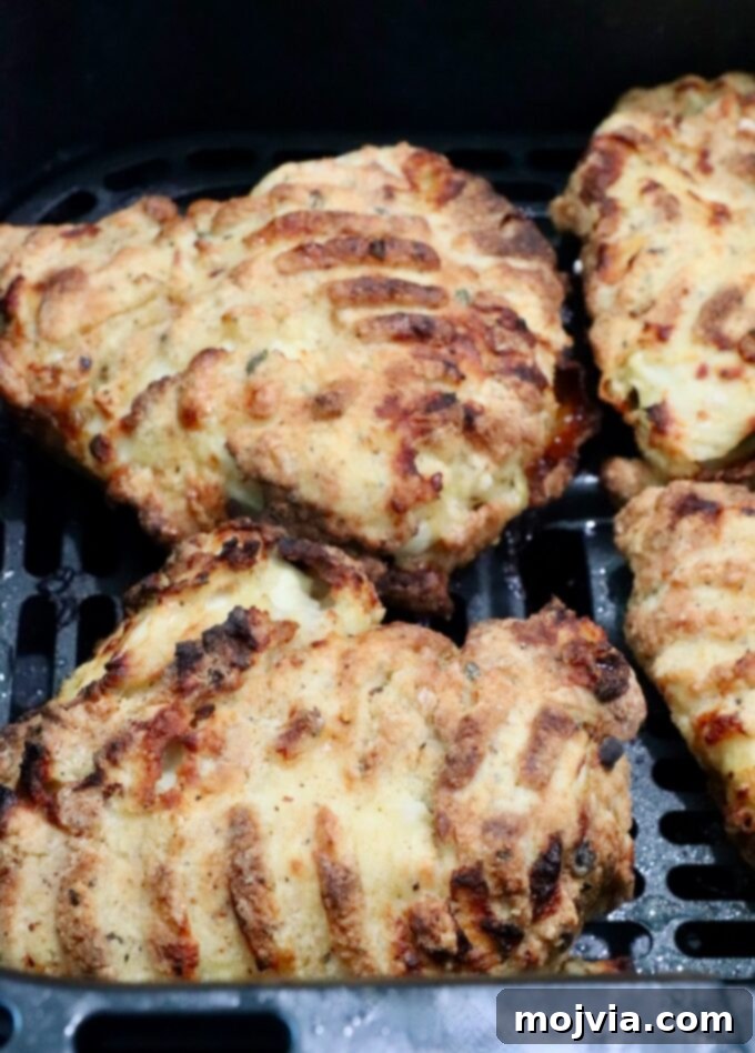 Crispy Air-Fried Chicken Sandwich 12 air fried chicken in an air fryer basket