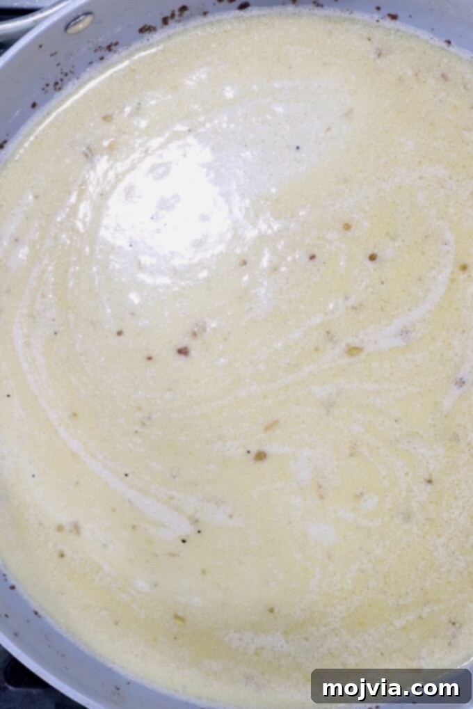 Creamy Peppercorn Meatballs 9 creamy pan sauce in a skillet