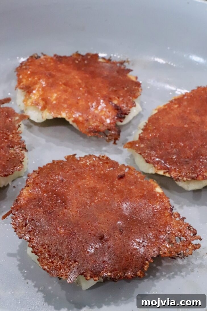 mozzarella cheese crusted raviolis in a skillet