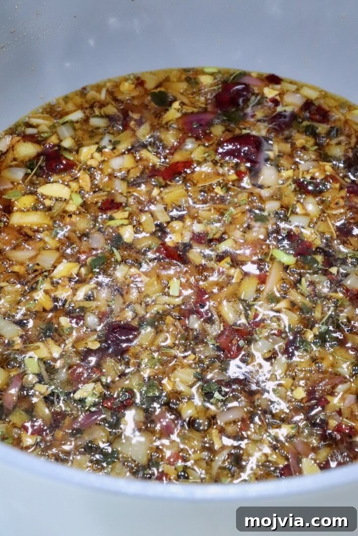 Calabrian Chili Crisp: Spicy Oil Recipe & Flavor Uses 10 Calabrian chili crisp in a pot