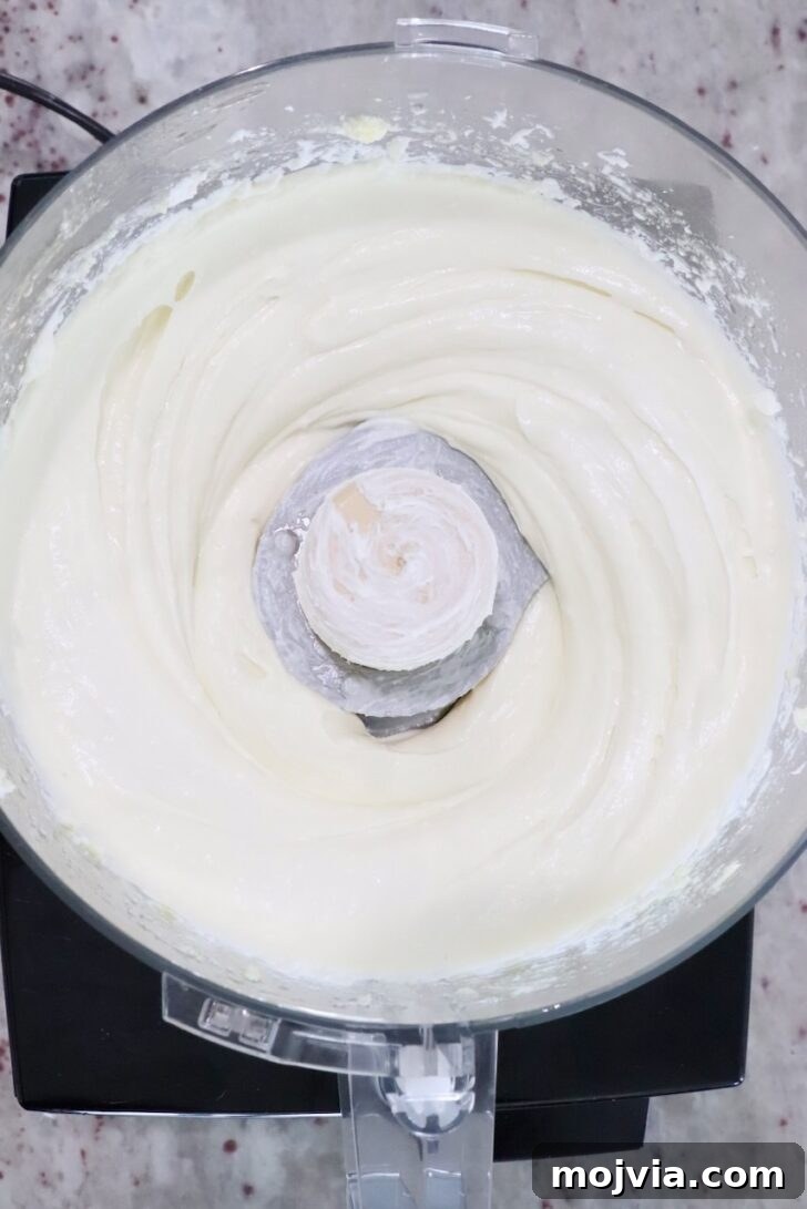 Whipped Goat Cheese Dip Recipe for Entertaining and Snacks 7 whipped goat cheese dip in a food processor