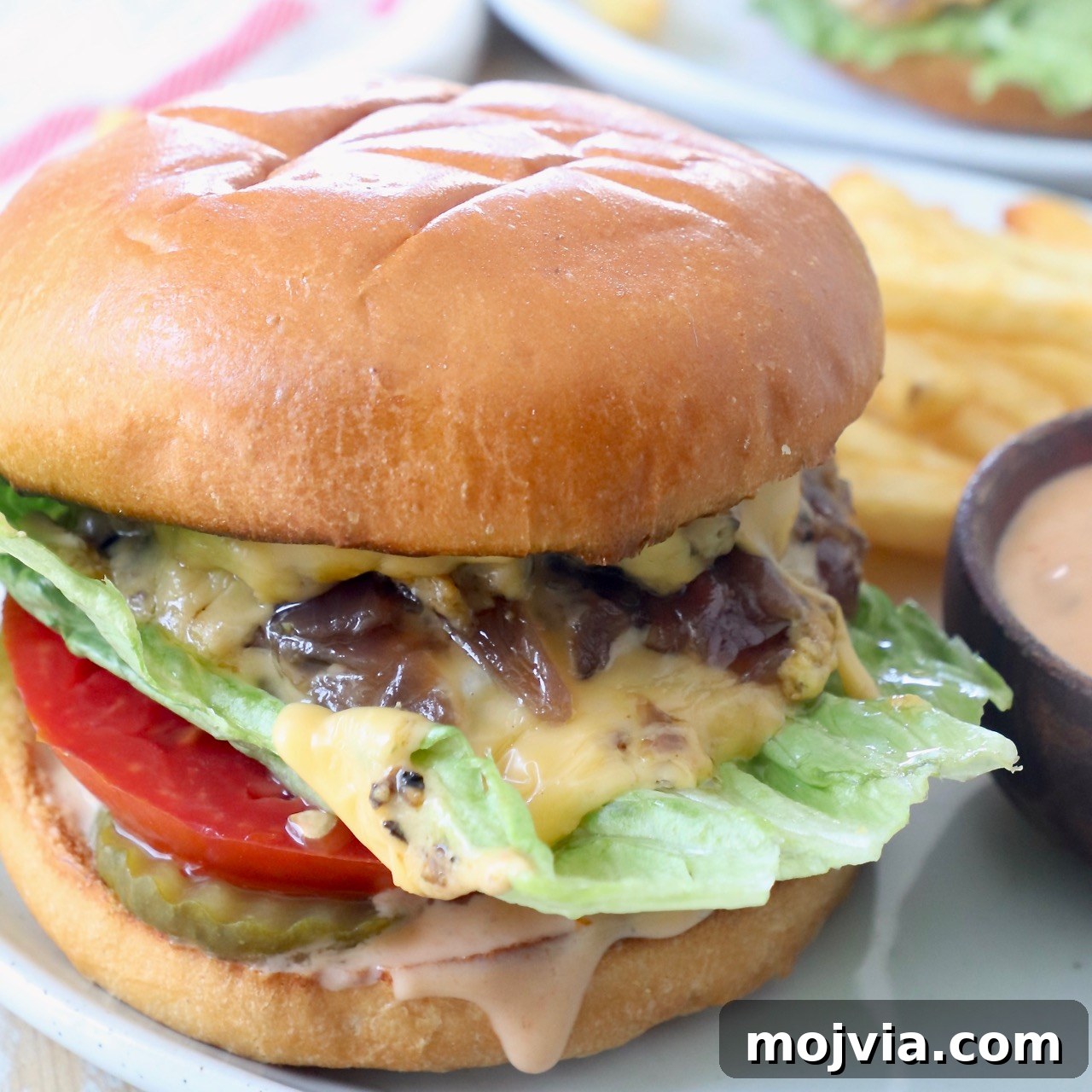 animal style burger on plate