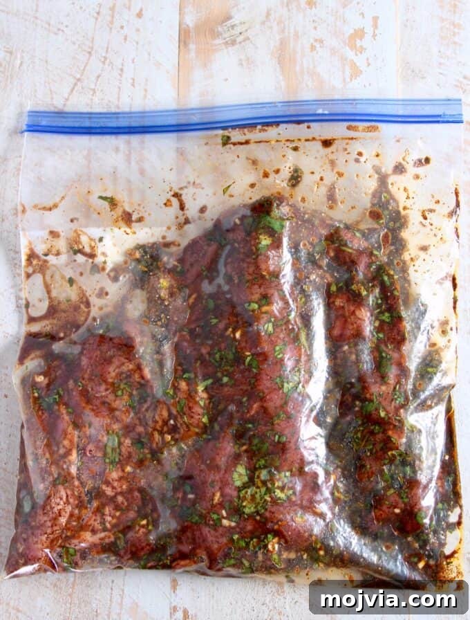 California Burrito Bowl with Carne Asada and Avocado 5 marinating carne asada in ziplock bag