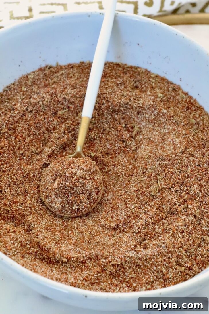 Authentic Barbacoa Seasoning Blend for Tacos and Burritos 6 barbacoa seasoning in a bowl with a spoon