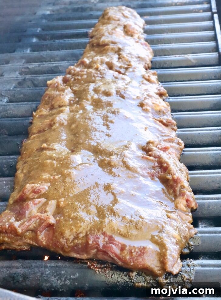 Authentic Jamaican Jerk Steak Recipe 6 jerk marinated skirt steak on a grill
